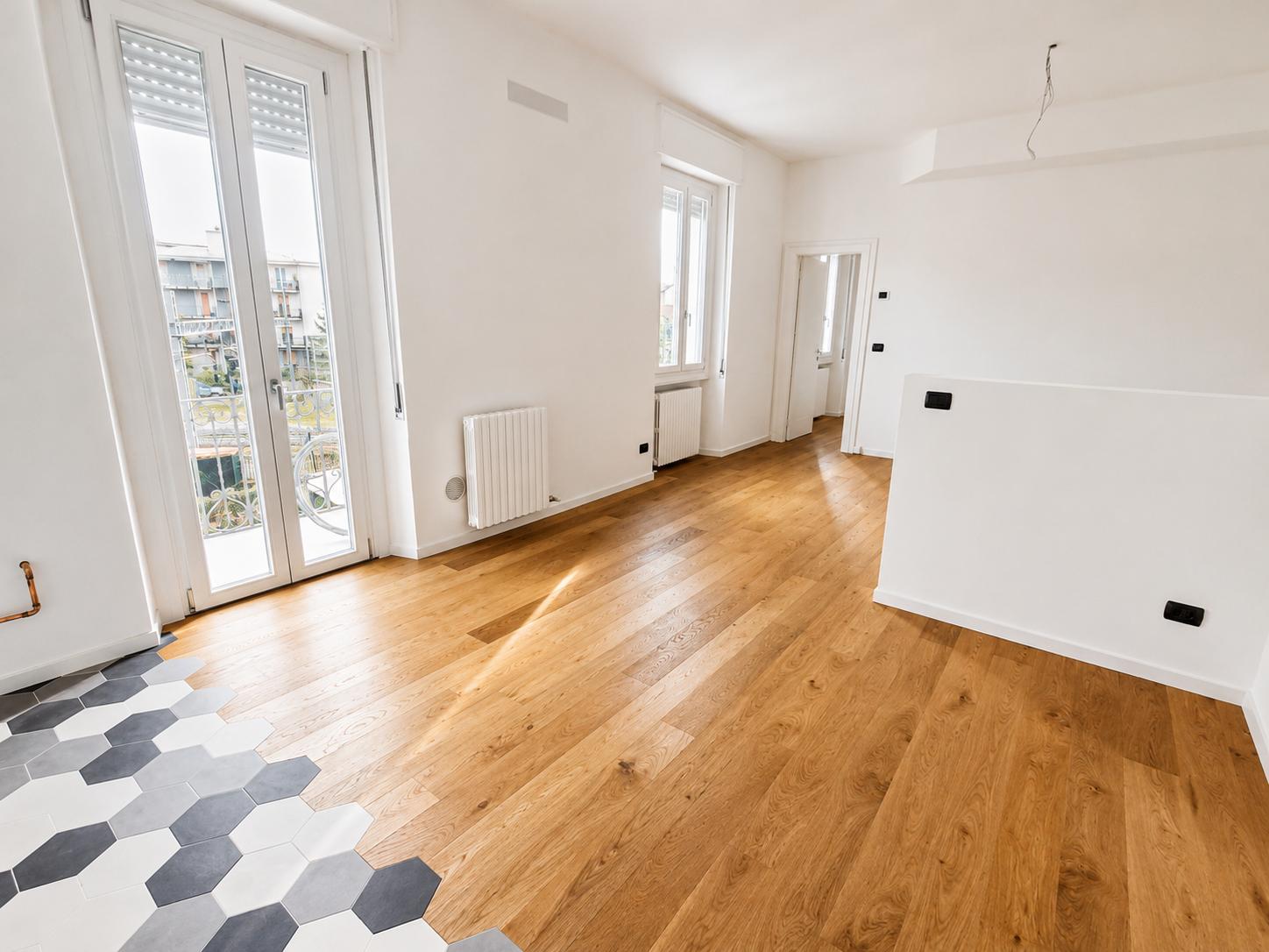 Monza Via Bergamo - soggiorno con parquet in legno